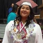 Female Graduate in Cap and Gown